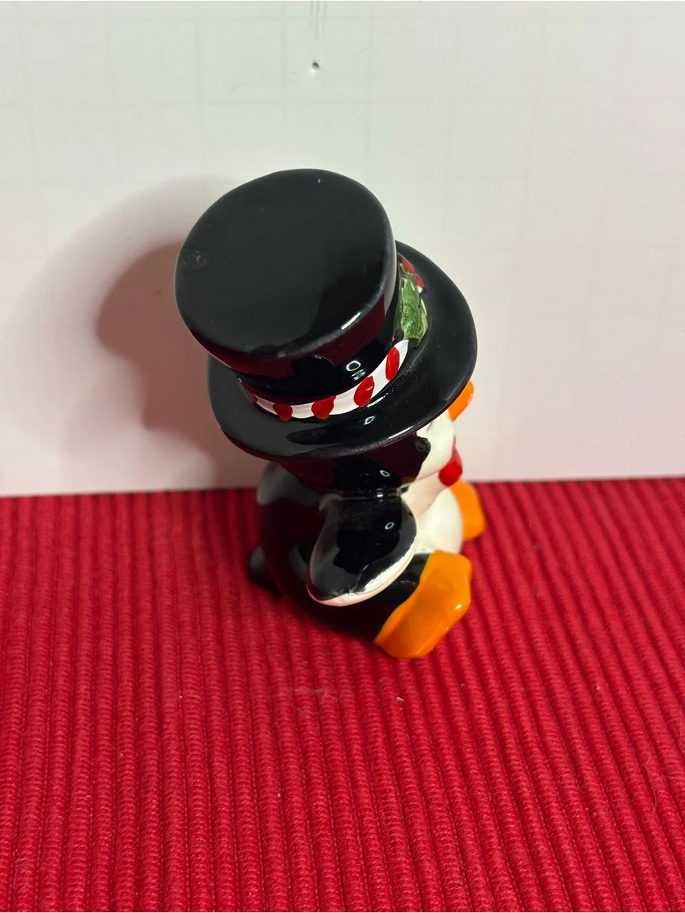 Festive Ceramic Penguin Figurine Holiday Decoration - Black & Orange